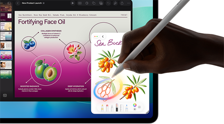iPad Pro, écran face avant avec fond dégradé bleu foncé et vert et plusieurs apps ouvertes, main tenant un Apple Pencil Pro encerclant un croquis et illustrant la fonctionnalité baguette graphique d’Apple Intelligence