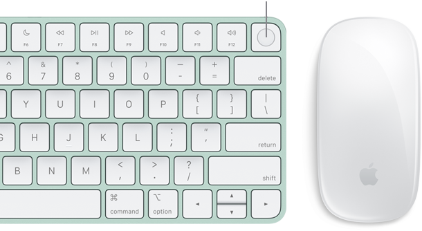 Close-up top view of Magic Keyboard with Touch ID, next to Magic Mouse.