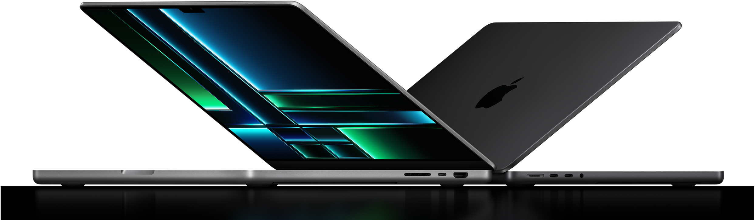 Side view of two MacBook Pros that are halfway open.
