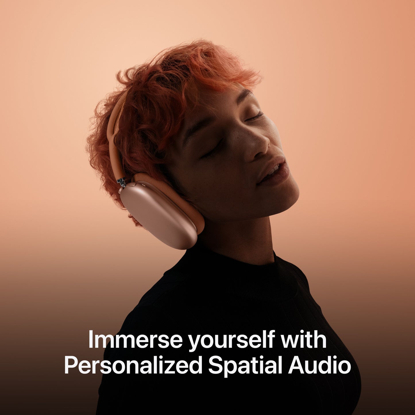 Person wearing AirPods Max highlighting Personalized Spatial Audio feature