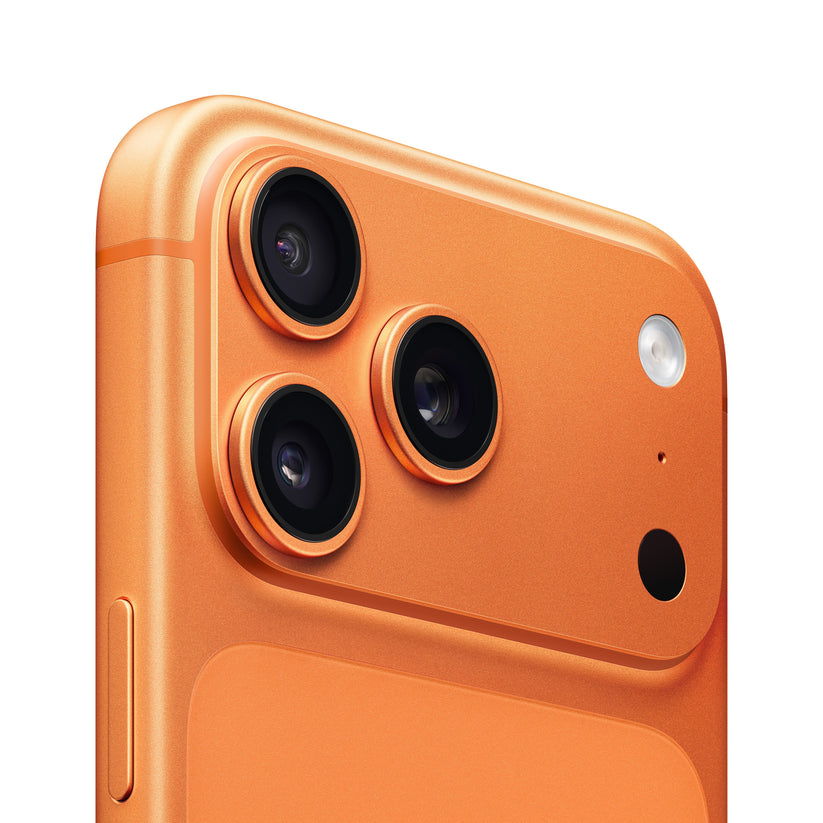 Close-up of iPhone 17 Pro Max in Cosmic Orange showing rear triple-camera system