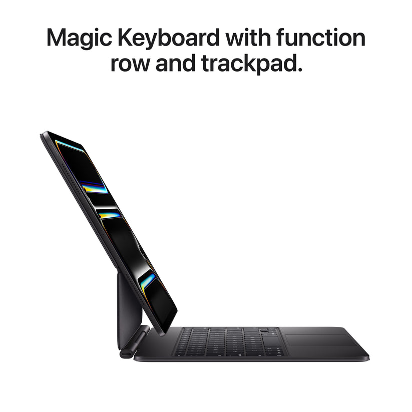 11-inch iPad Pro M5 Wi-Fi + Cellular 1TB Standard Glass in Silver attached to Magic Keyboard with function row and trackpad